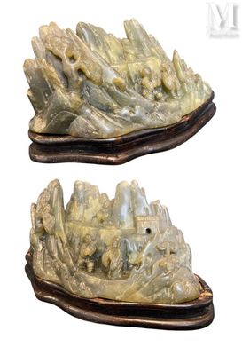 pair of carved jade sculptures of a mountain and a river