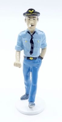 a figurine of a man dressed in a police uniform