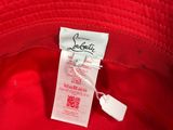 red bucketer hat with a tag on the side of it