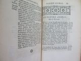 an open book with a picture of a bird on it