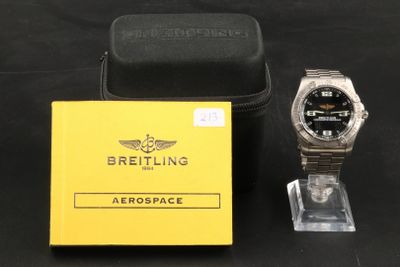 an image of a watch and a watch case on a table
