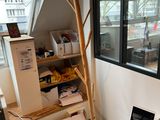 a picture of a room with a desk and a window