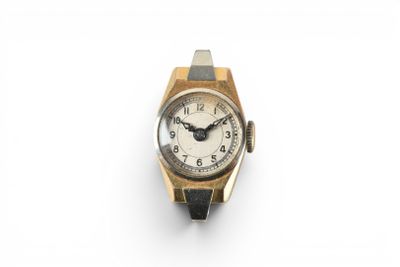 an image of a watch on a white surface with a white background
