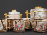 a group of cups that are sitting on a table