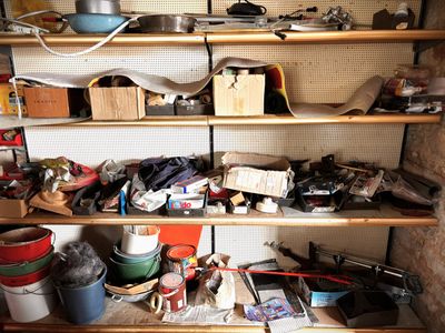 a shelf with many items on it in a room