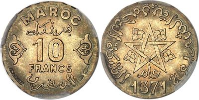 a gold coin with a star on the front and a star on the back