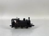 a toy train that is sitting on a white surface