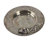 a silver plate with a dragon on it on a white background
