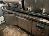 two ovens sitting on top of each other in a kitchen