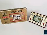 a box with a game on it and a game on the screen