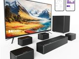 an image of a tv with speakers and a remote control