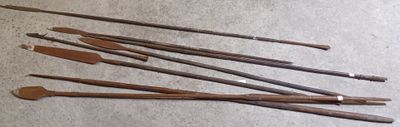 a lot of different types of arrows on the floor
