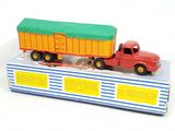 a toy truck that is sitting on top of a box