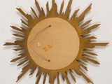 a picture of a sun clock made out of cardboard