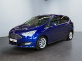 une Ford C-Max bleue garée dans un showroom
