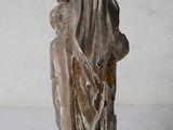 statue of a woman holding a child in her arms