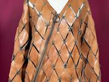 an image of a brown leather jacket on a mannequin mannequin