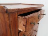 a close up view of a wooden desk with drawers
