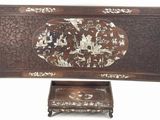 an image of a wooden table with two trays on top of it