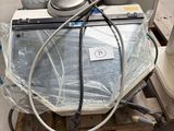 a machine that is sitting on top of a pallet