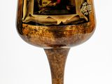 a wooden table lamp that has a picture on it