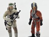 two figurines of a man and a woman dressed in star wars costumes