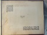 an open book with a picture of a plane on it