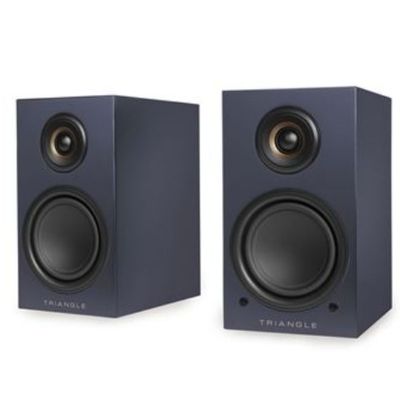 a pair of speakers sitting next to each other on a white surface