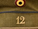 a close up of a hat with the number 12 on it
