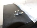 a pair of ear buds sitting on top of a desk
