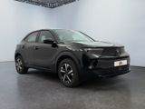 the new toyota c - hr suv is parked in a showroom