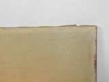 an old book sitting on top of a wooden table