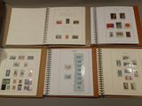 many different types of stamps on the pages of a book