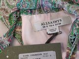 an image of a close up of a dress with a price tag on it