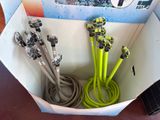 a box with a bunch of hoses inside of it