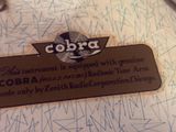 a label that says cobra on it on a piece of paper