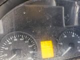 a close up of a car dashboard with a yellow sticker on it