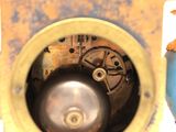 a close up view of a clock on a table