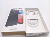 packaging of a samsung galaxy s9 with a charger and cable in it