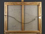 an old wooden easel with a drawing of a bird on it