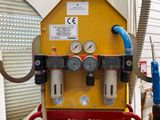a machine that is sitting inside of a building