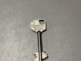 a key that is sitting on top of a table