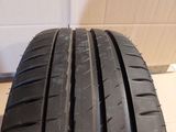 a close up of a tire on the floor of a room
