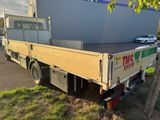 a truck that is parked on the side of the road