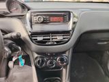 the dashboard of a car with a radio and a steering wheel