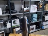 a vacuum that is sitting on a table in a room