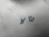 a small tattoo on the chest of a man
