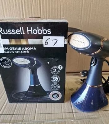 une boîte contenant un sèche-cheveux et une boîte sur laquelle est représentée une lampe