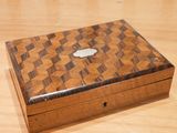a wooden box that has a apple logo on it