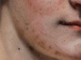 a close up of a painting of a woman ' s face with freckled hair
